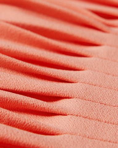 橙粉色花边修身百褶半身裙