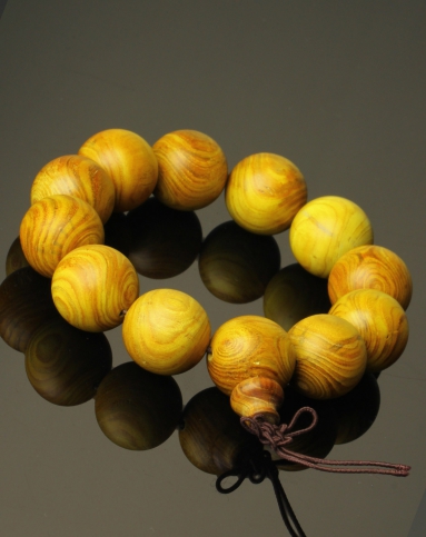 中性黄金木对眼佛珠手串